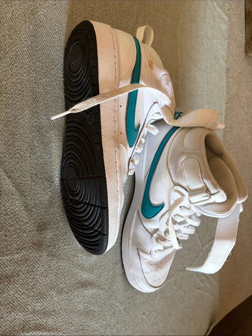 Nike White Youth High-Top Sneakers with Teal Swoosh